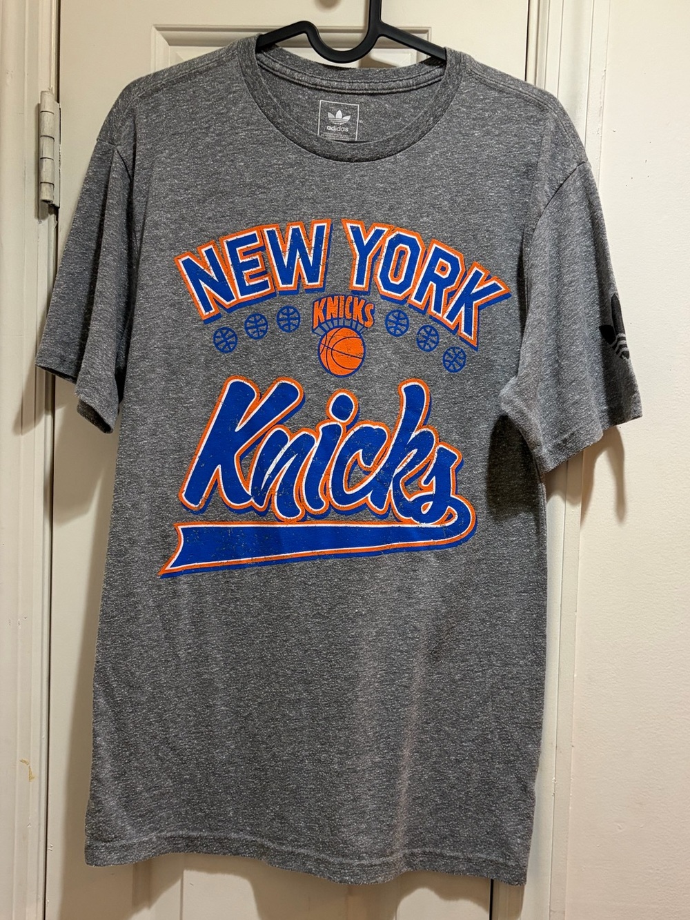 Adidas Grey New York Knicks Graphic Tee with Blue & Orange Logo